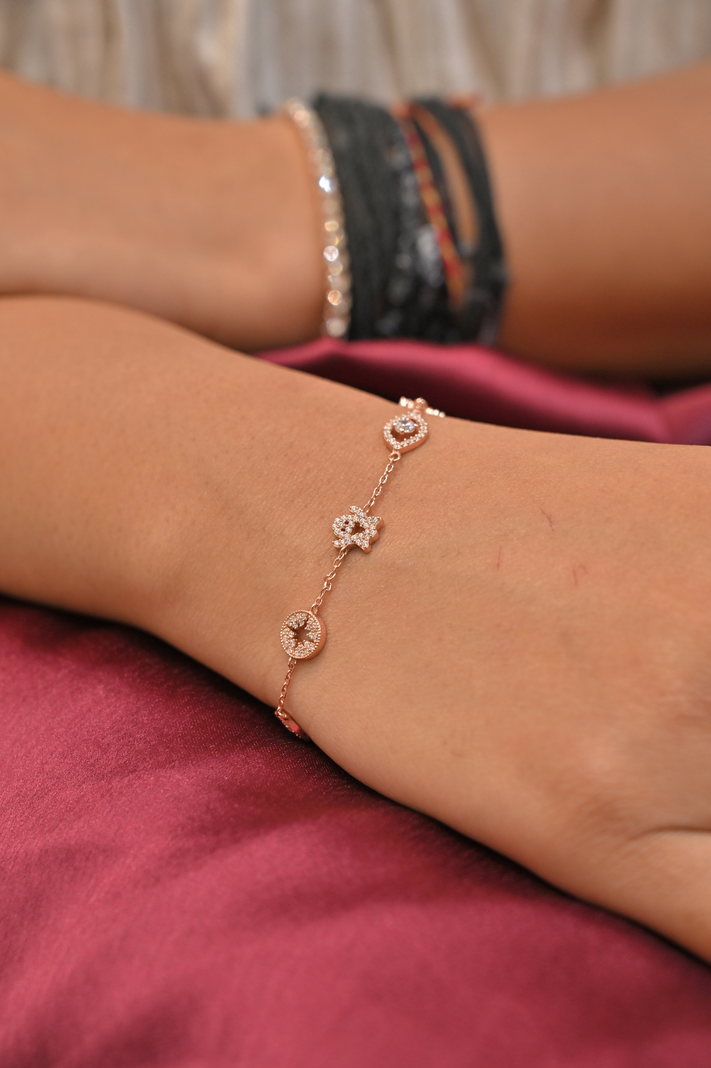 lucky charm multi-motif silver bracelet