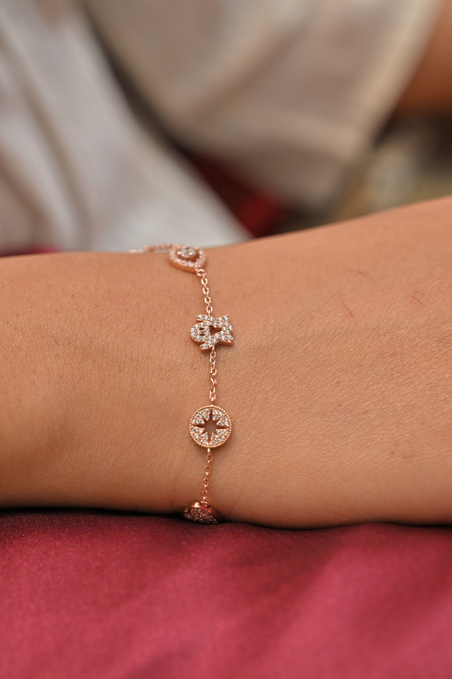 lucky charm multi-motif silver bracelet