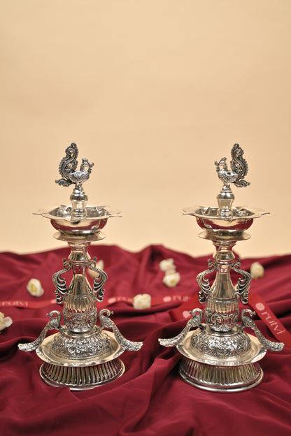 German Silver Peacock Samayi Diya Pair with Ornamental Base – Traditional Oil Lamps for Pooja & Décor