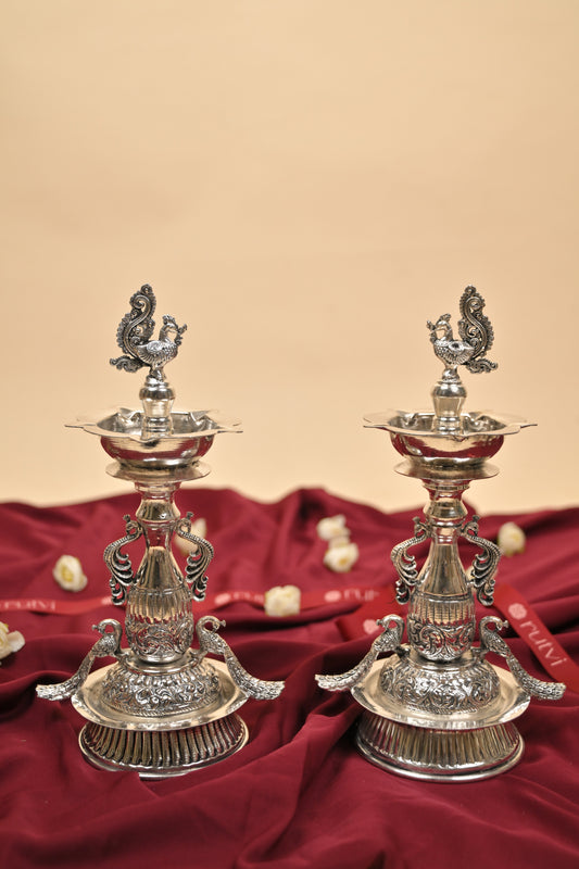 German Silver Peacock Samayi Diya Pair with Ornamental Base – Traditional Oil Lamps for Pooja & Décor