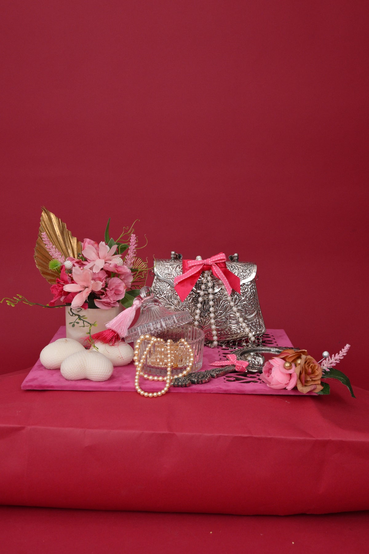 decorative gift hamper with silver-toned bags & tray