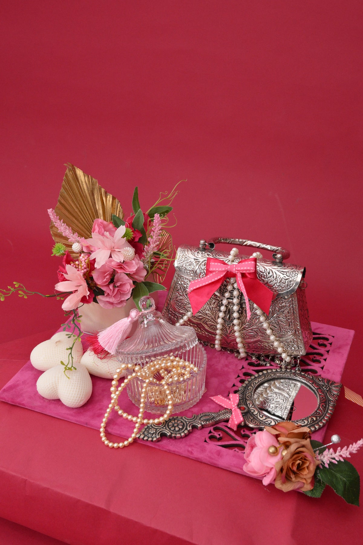 decorative gift hamper with silver-toned bags & tray