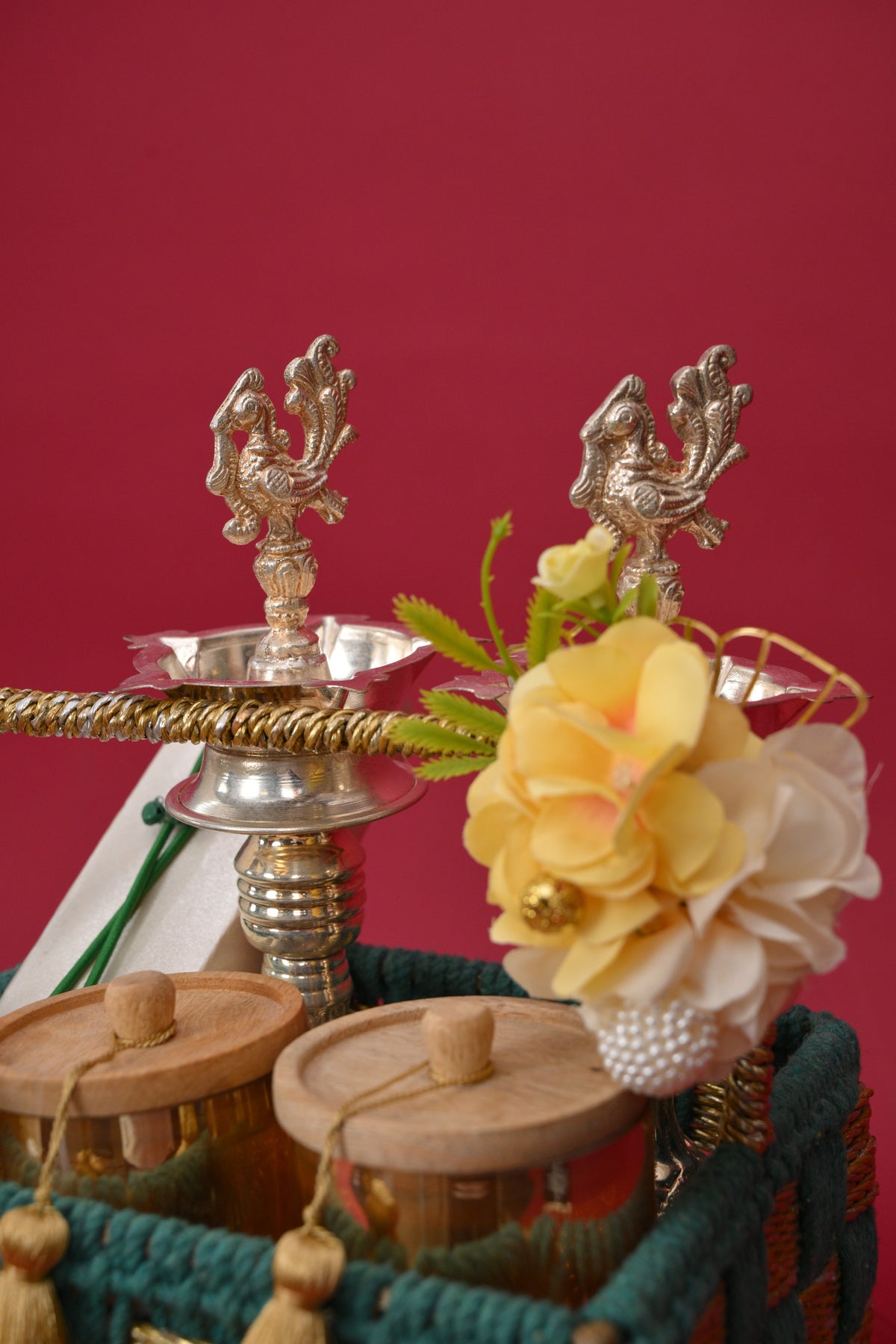 decorative gift basket with diyas & wooden jars