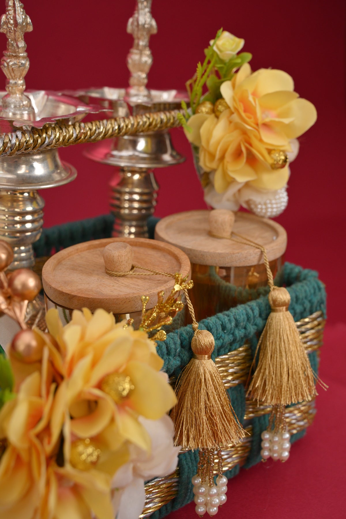 decorative gift basket with diyas & wooden jars