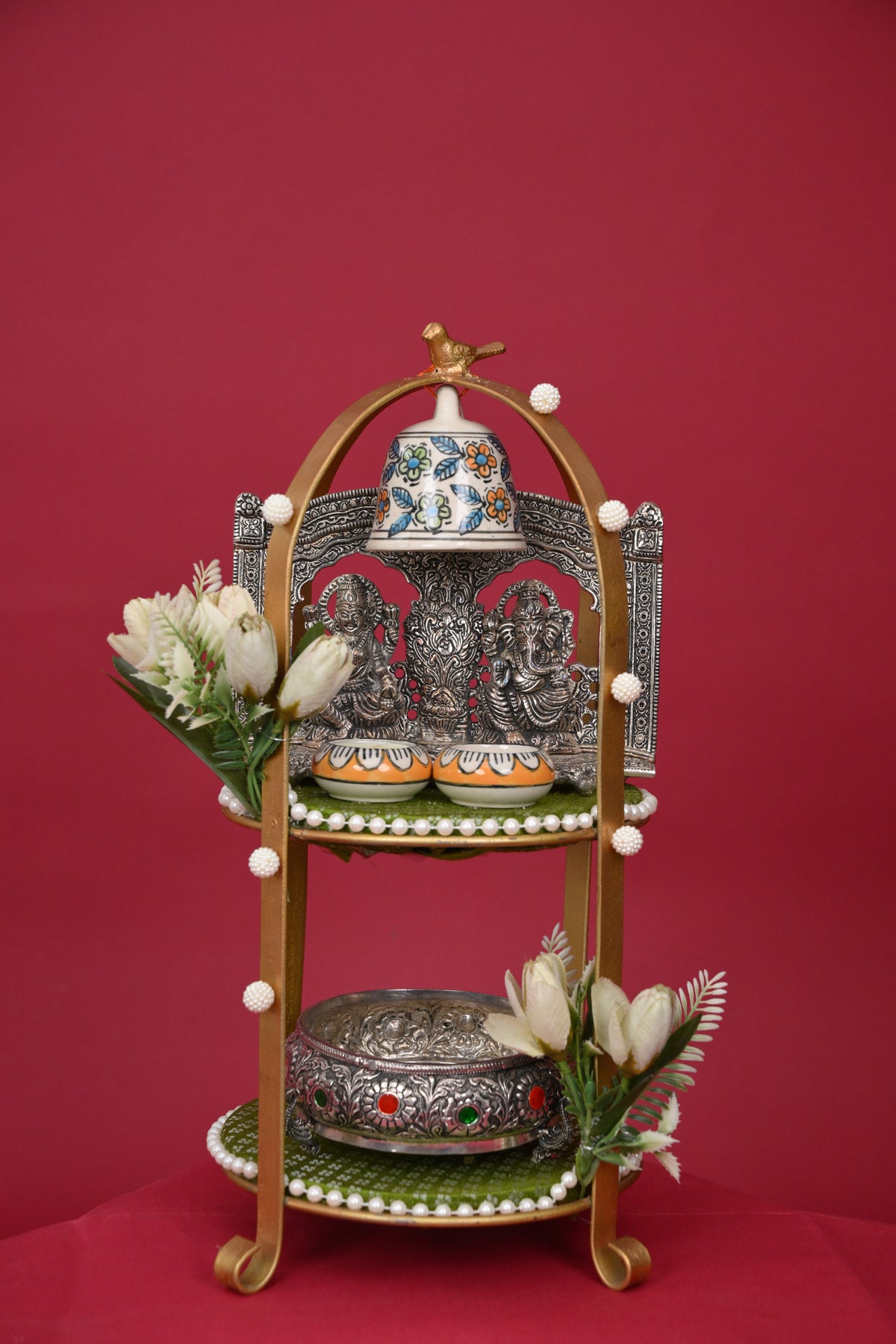 three-tier pooja decor stand with idols & bell