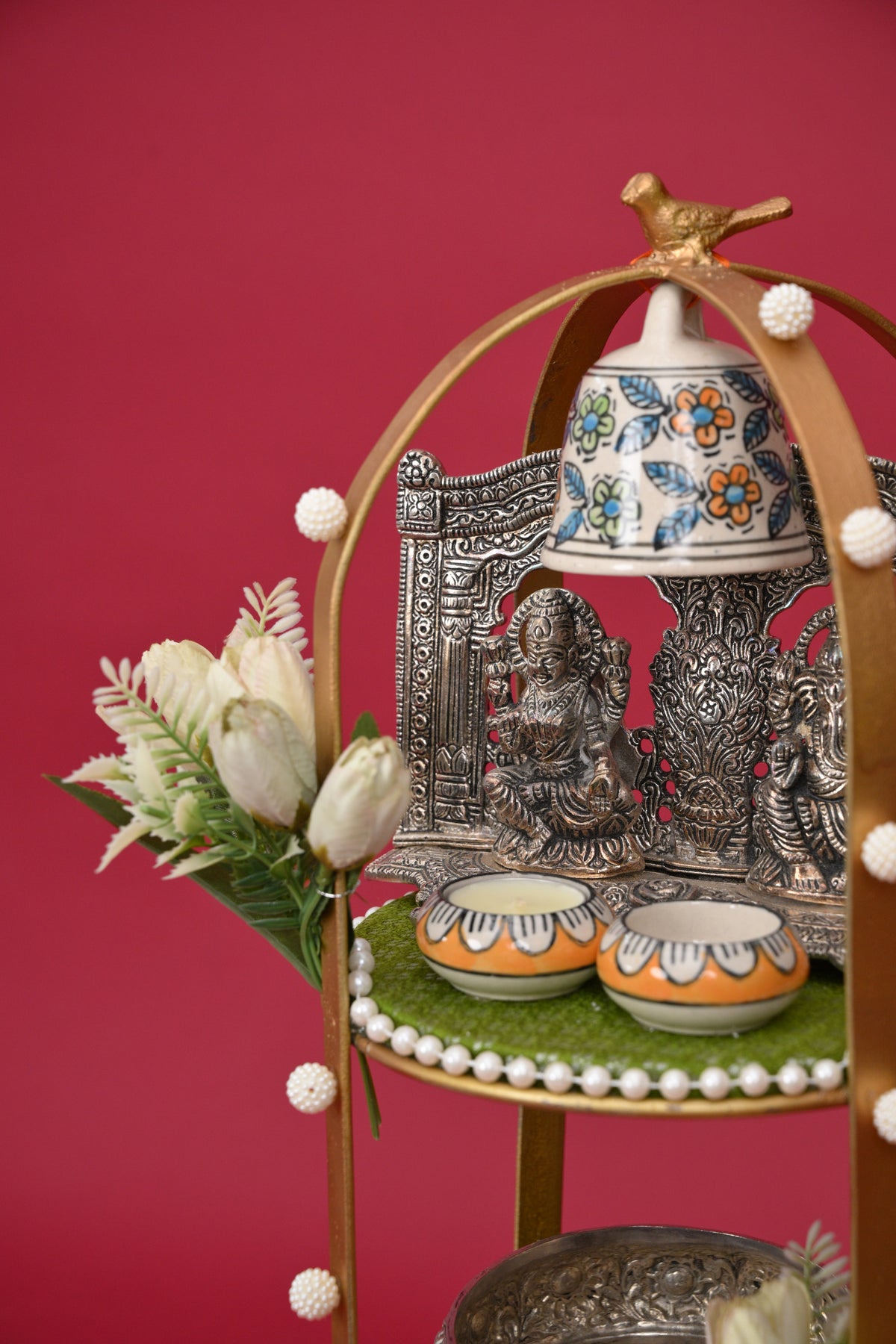 three-tier pooja decor stand with idols & bell