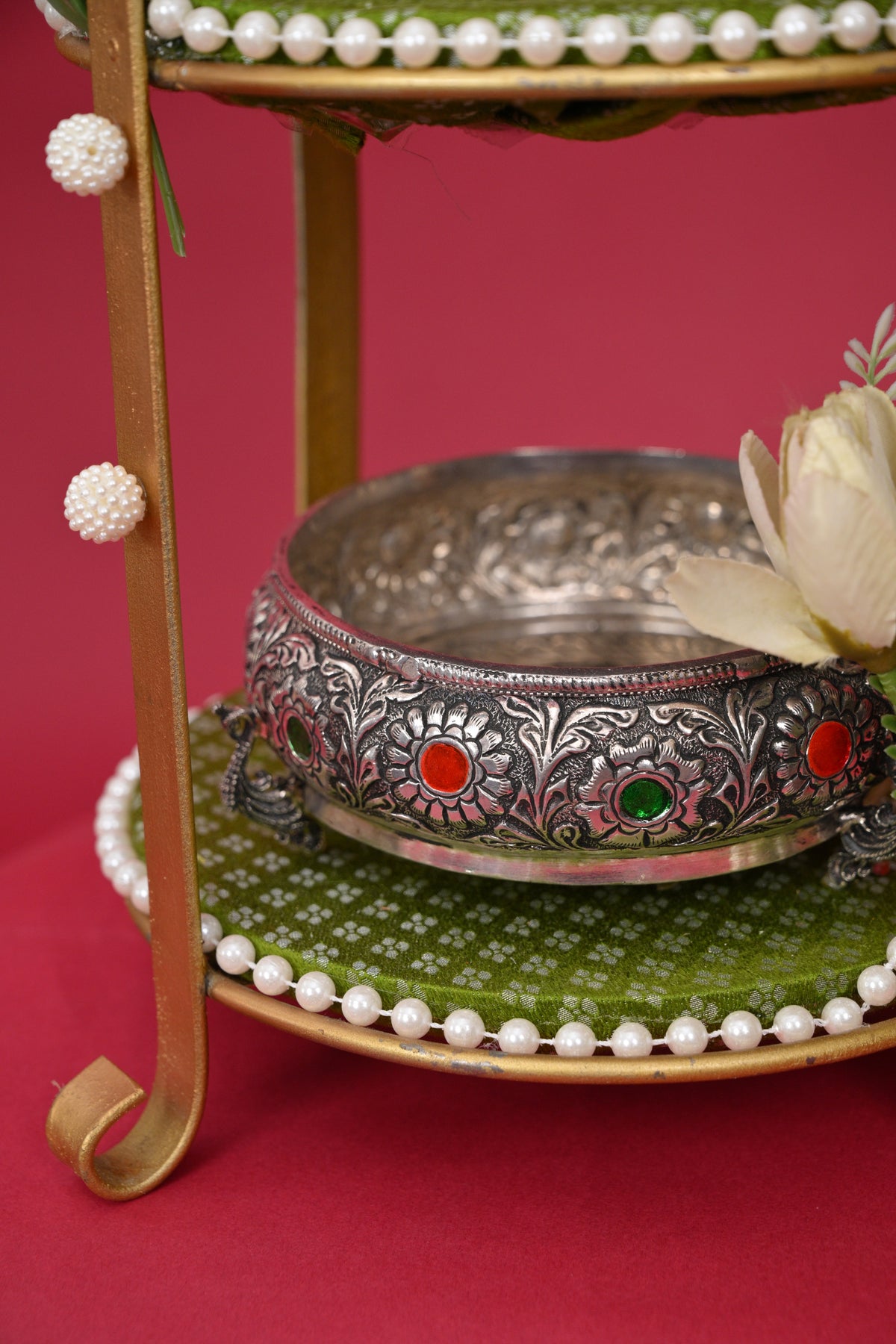 three-tier pooja decor stand with idols & bell