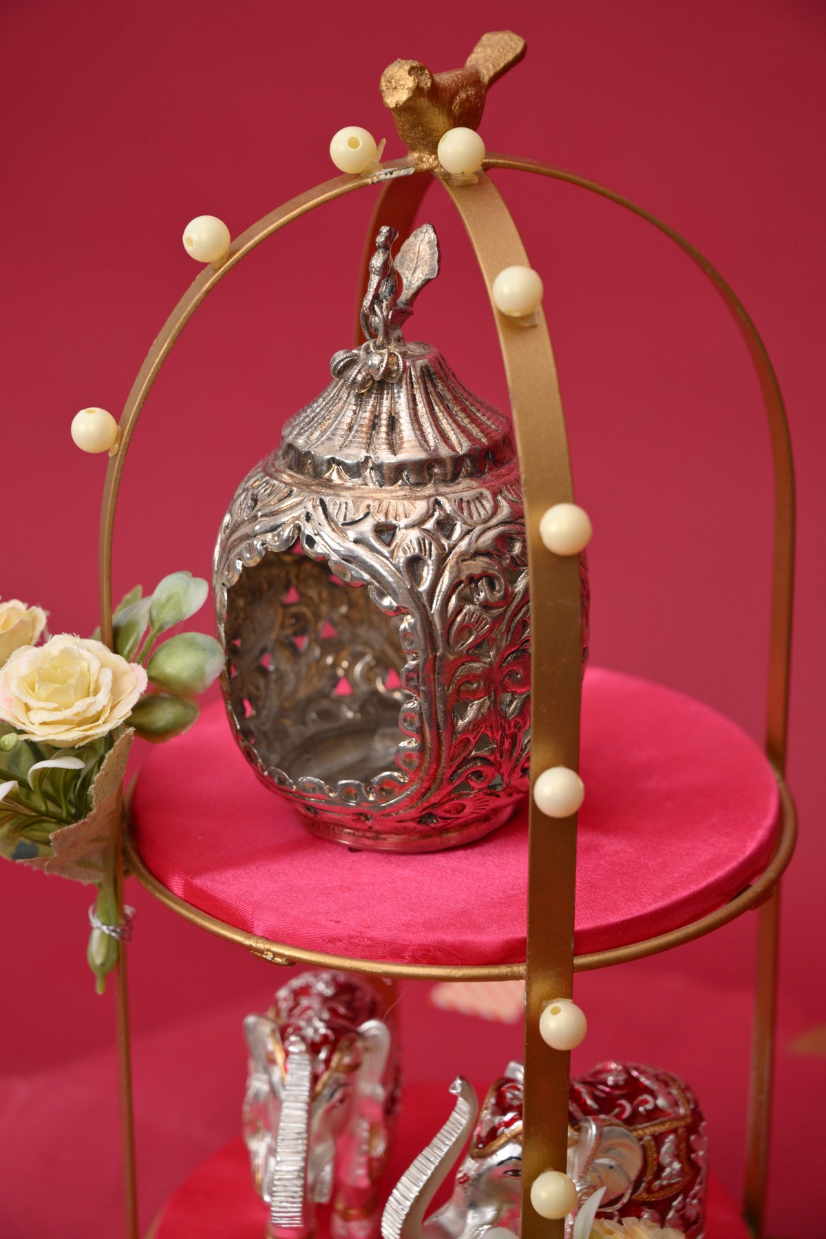 two-tier decorative pooja stand with ganesha & diyas