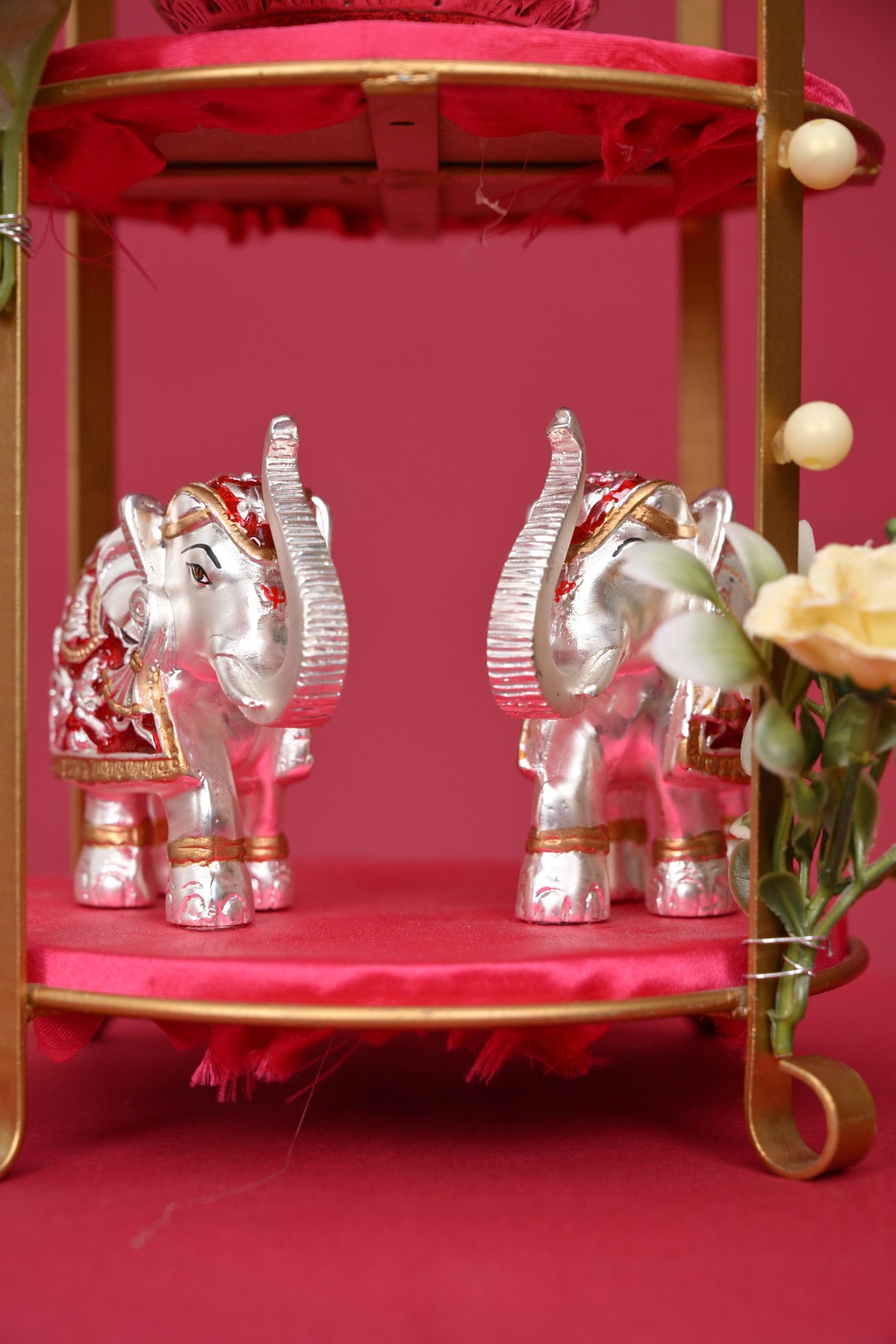 two-tier decorative pooja stand with ganesha & diyas