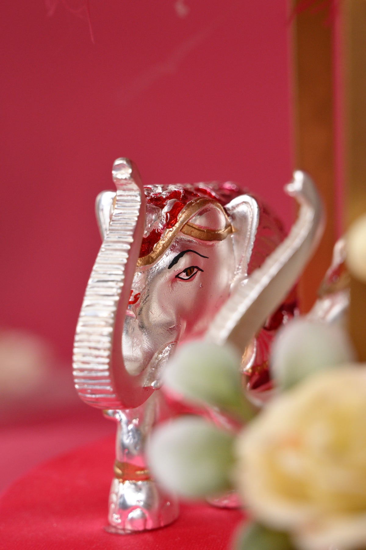 two-tier decorative pooja stand with ganesha & diyas