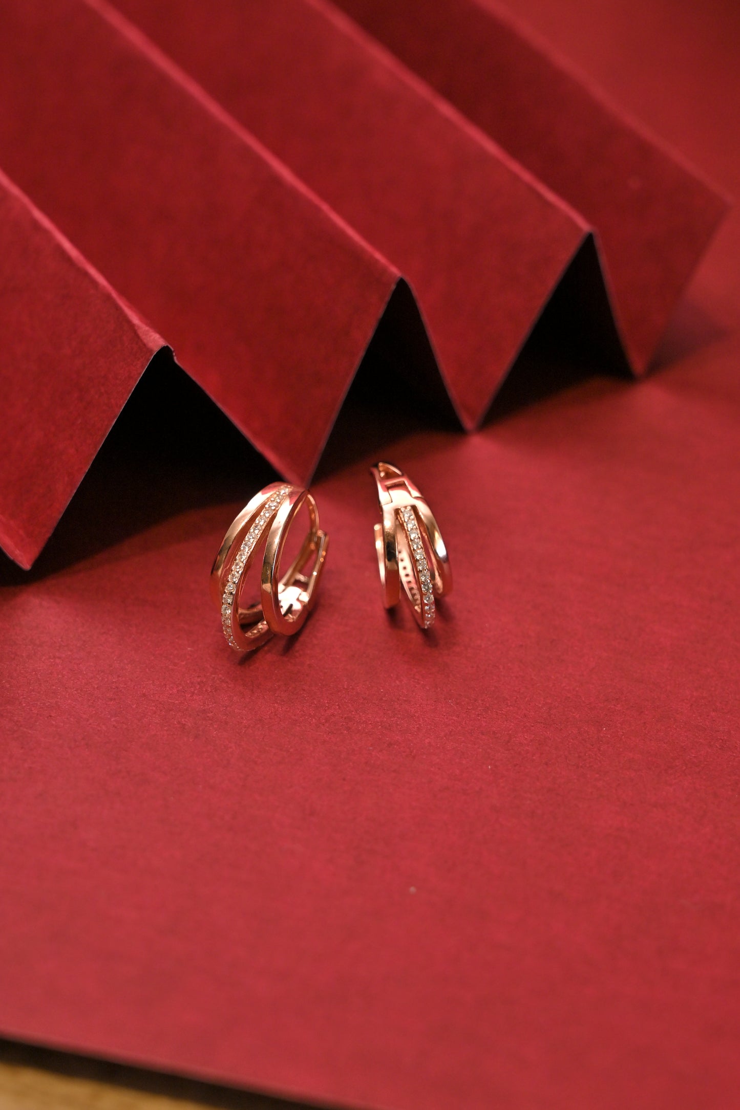 rose gold criss cross cz hoop earrings