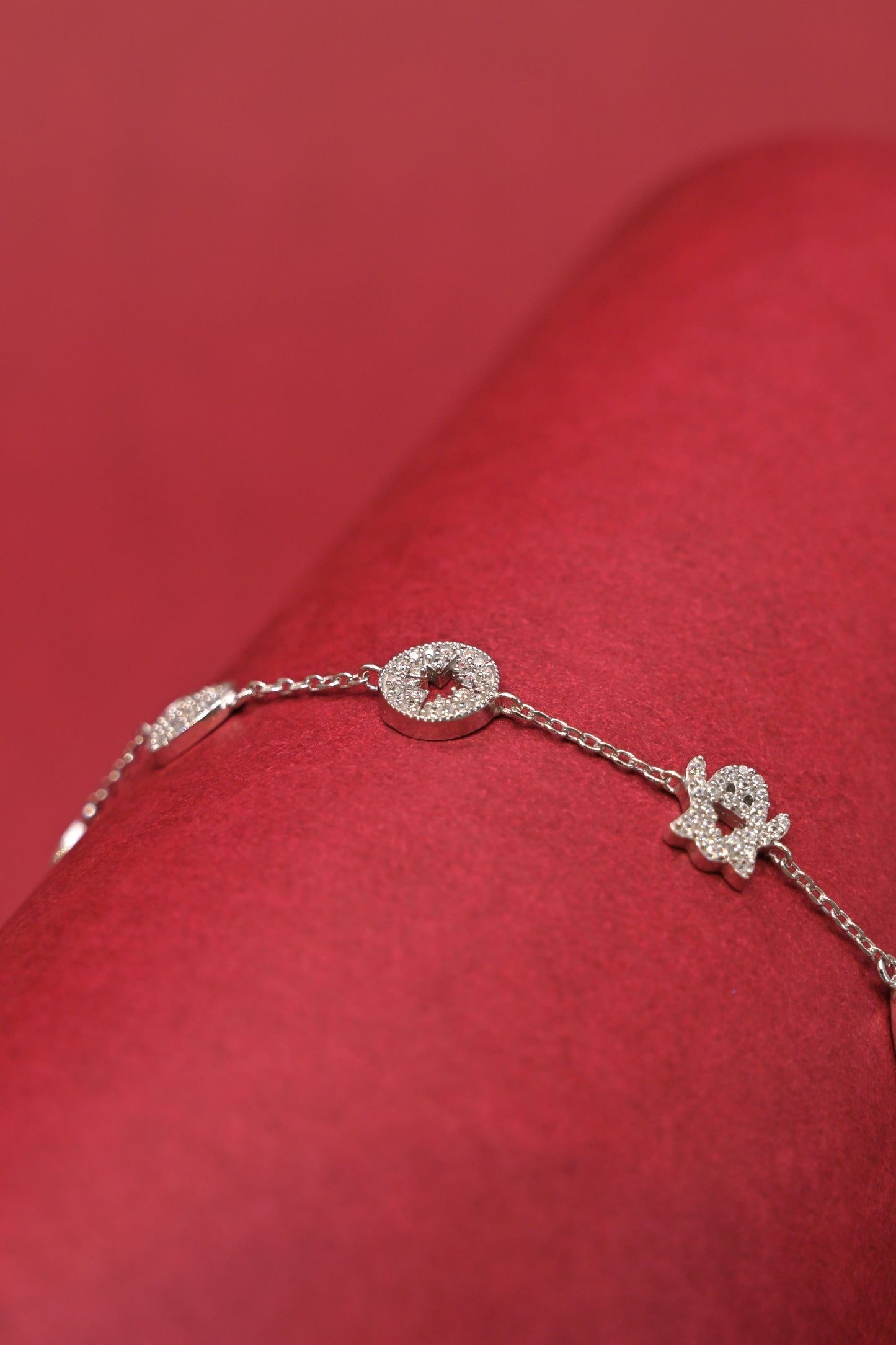 lucky charm multi-motif silver bracelet