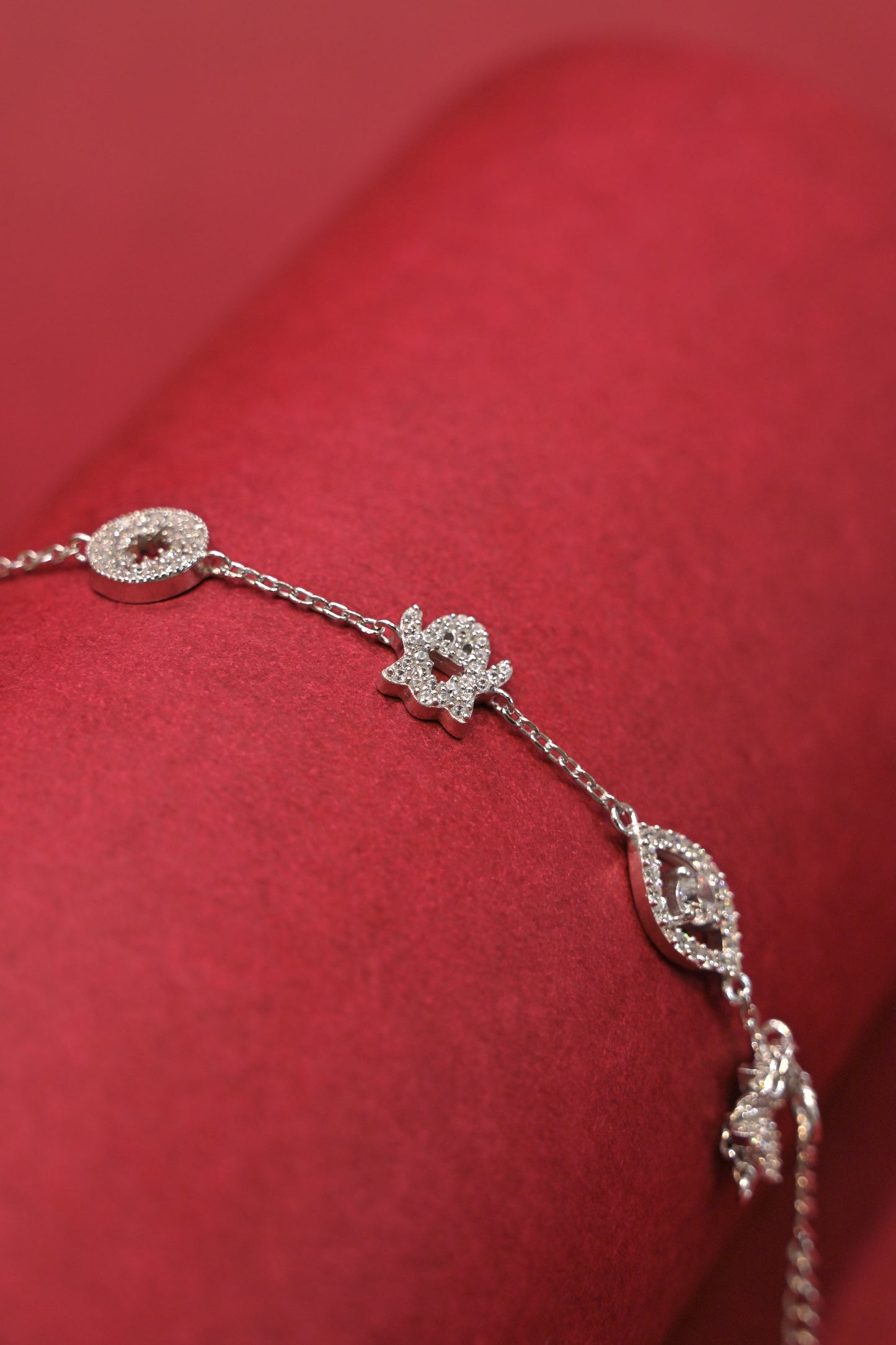 lucky charm multi-motif silver bracelet