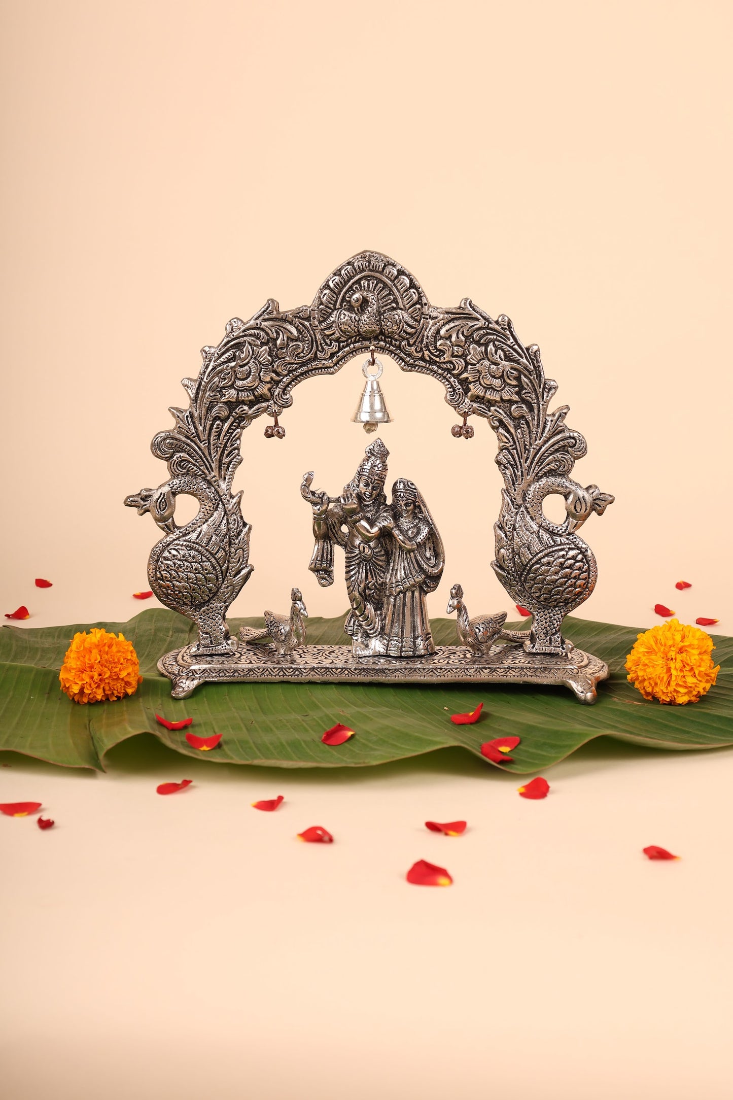 Radha Krishna with Bells and Peacock Frame – Handcrafted German Silver Wall Decor for Temple & Home