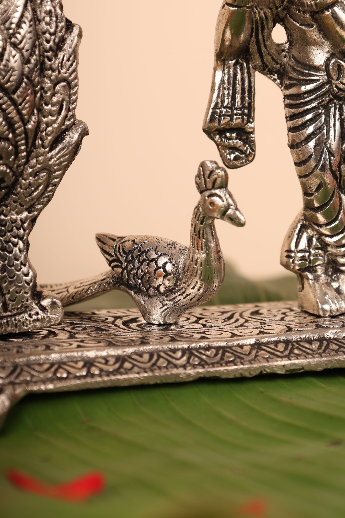 Radha Krishna with Bells and Peacock Frame – Handcrafted German Silver Wall Decor for Temple & Home