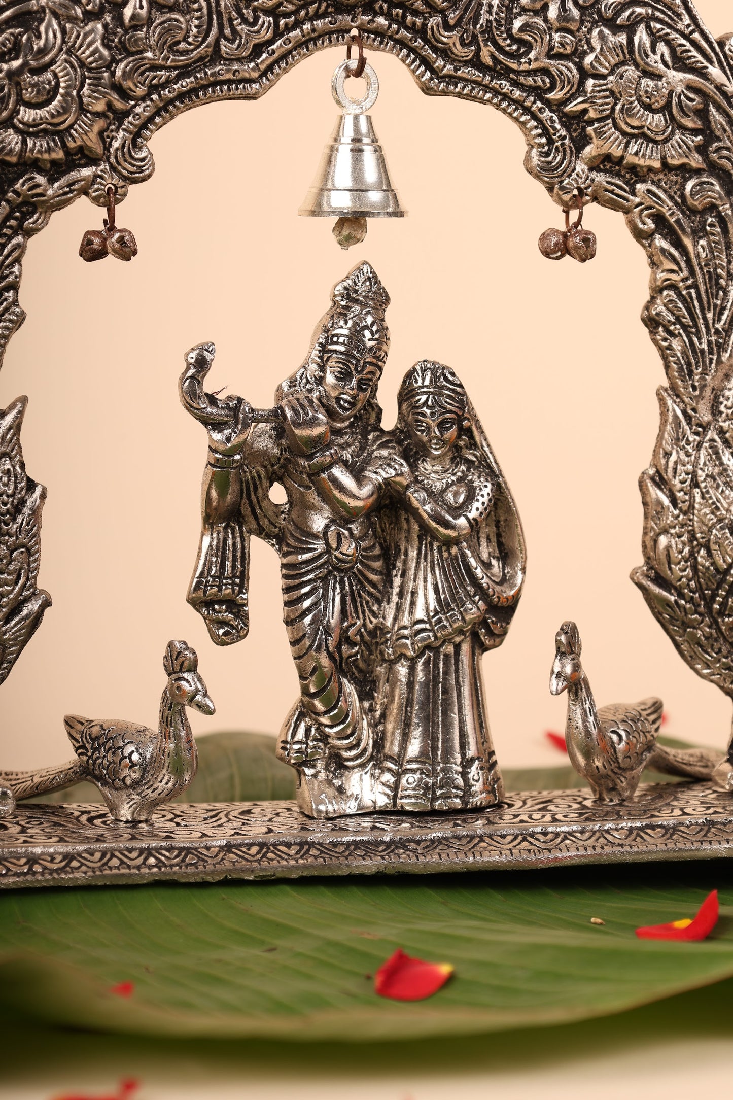 Radha Krishna with Bells and Peacock Frame – Handcrafted German Silver Wall Decor for Temple & Home